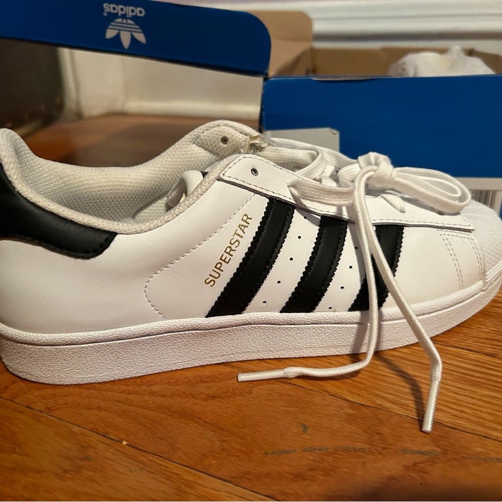 Never worn Adidas Superstar size 8